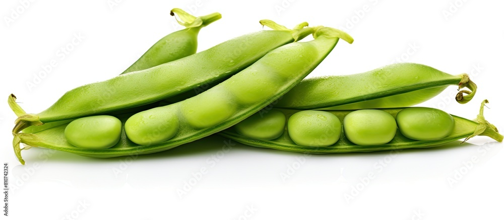 A copy space image of isolated sugar snap peas on a white background A copy space image of isolated sugar snap peas on a white background