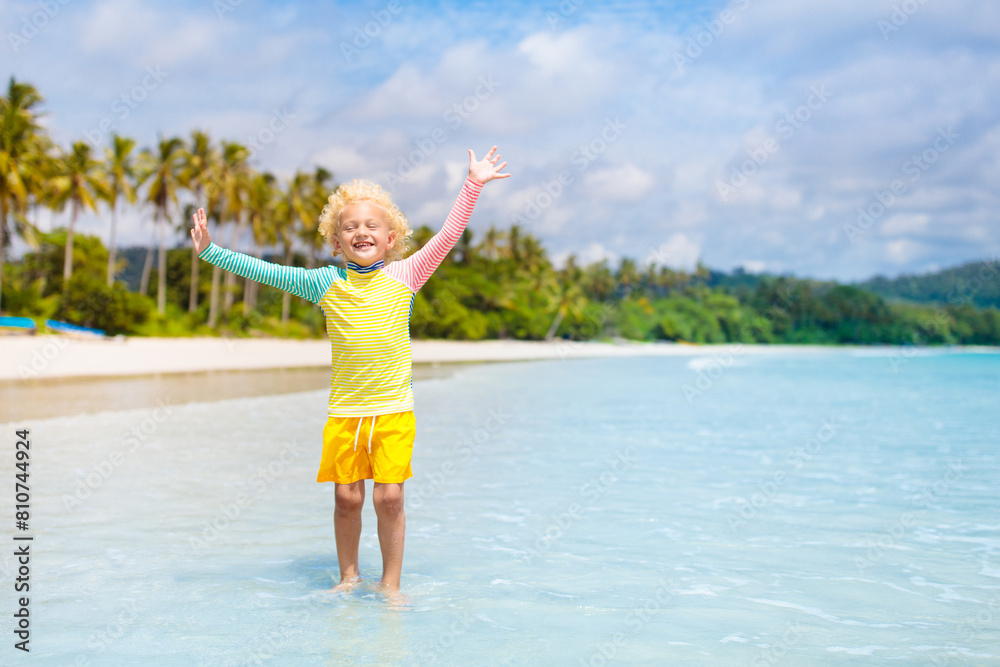 Child on tropical beach. Sea vacation with kids. Child on tropical beach. Sea vacation with kids.