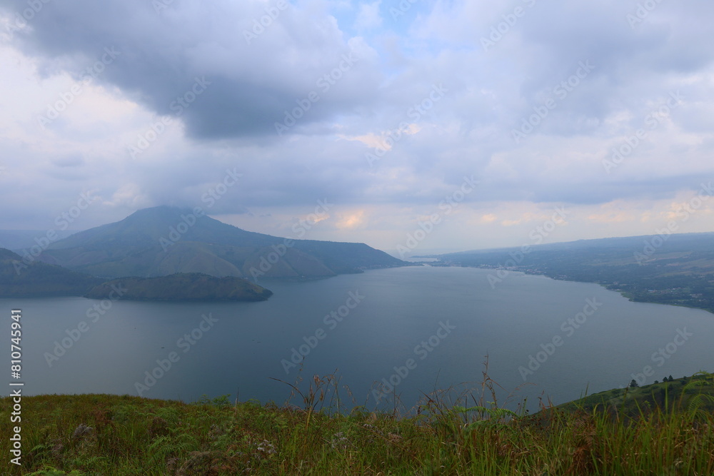 Stunning scenery of volcanic lake Toba - largest and deepest crater lake in the world located in North Sumatra, Indonesia