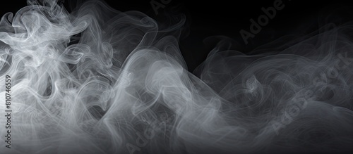 A smoke and powder overlay on a black background creates an isolated white fog with a smoky effect perfect for enhancing photos and artworks Includes copy space image photo