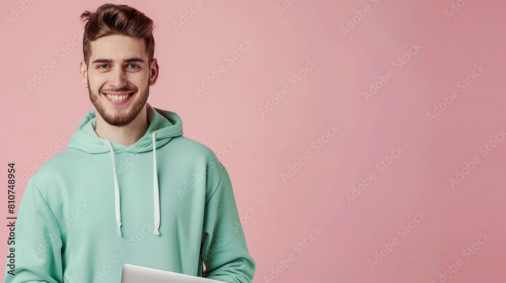 Obraz premium A Smiling Young Man in Hoodie