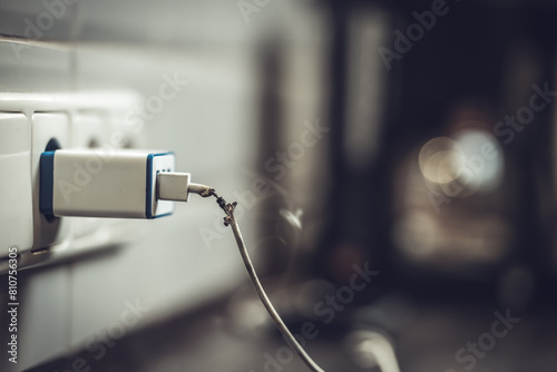 Concept of danger, use of non-standard equipment, worn-out equipment. Broken cable in socket