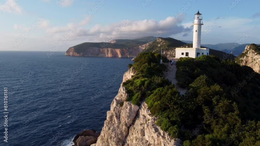 An orbiting shot of the lighthouse and cliffs of Lefkada, Greece An orbiting shot of the lighthouse and cliffs of Lefkada, Greece