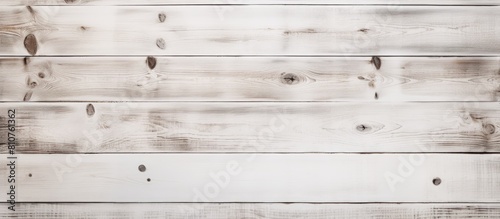 A copy space image with a white background made of textured wood planks