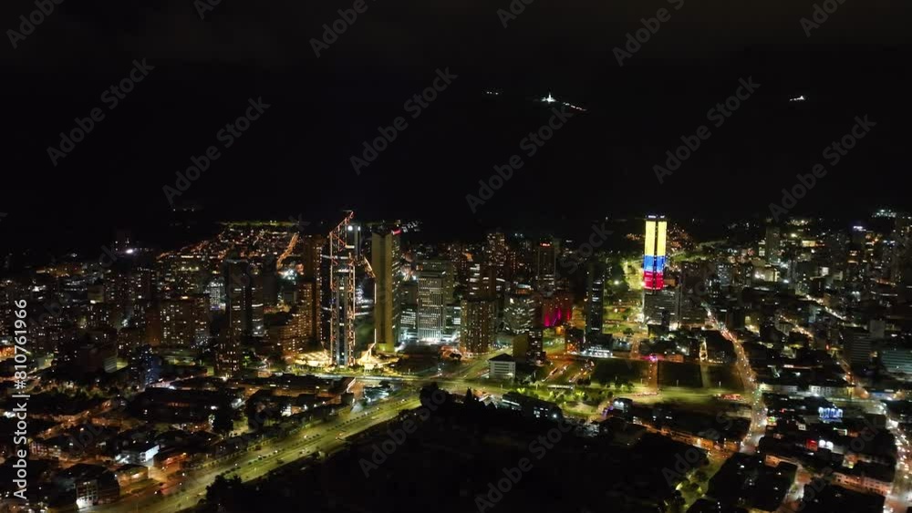 Aerial tracking shot of night lit skyscrapers in downtown of Bogota, Colombia Aerial tracking shot of night lit skyscrapers in downtown of Bogota, Colombia