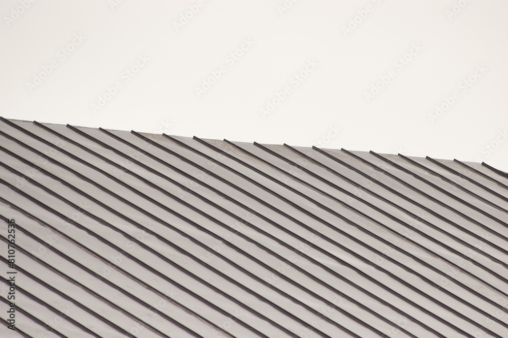 new roof of a building against a background of gray sky