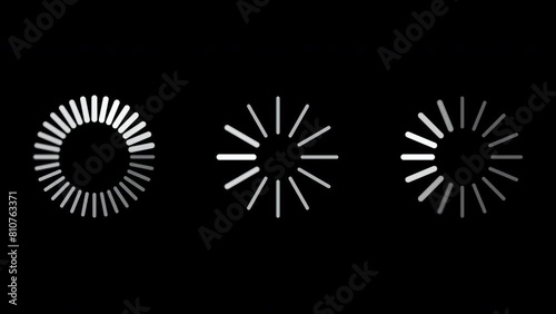 Pack of three white loading icons, each representing a different style of loading or buffering animation, on a black background photo