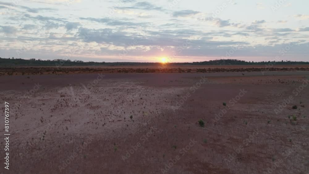 Pink sunrise at dawn over west Australian desert outback Pink sunrise at dawn over west Australian desert outback