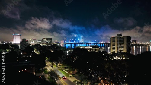 Jacksonville Florida Skyline at night by the St. John's River and view of some of the bridges. photo