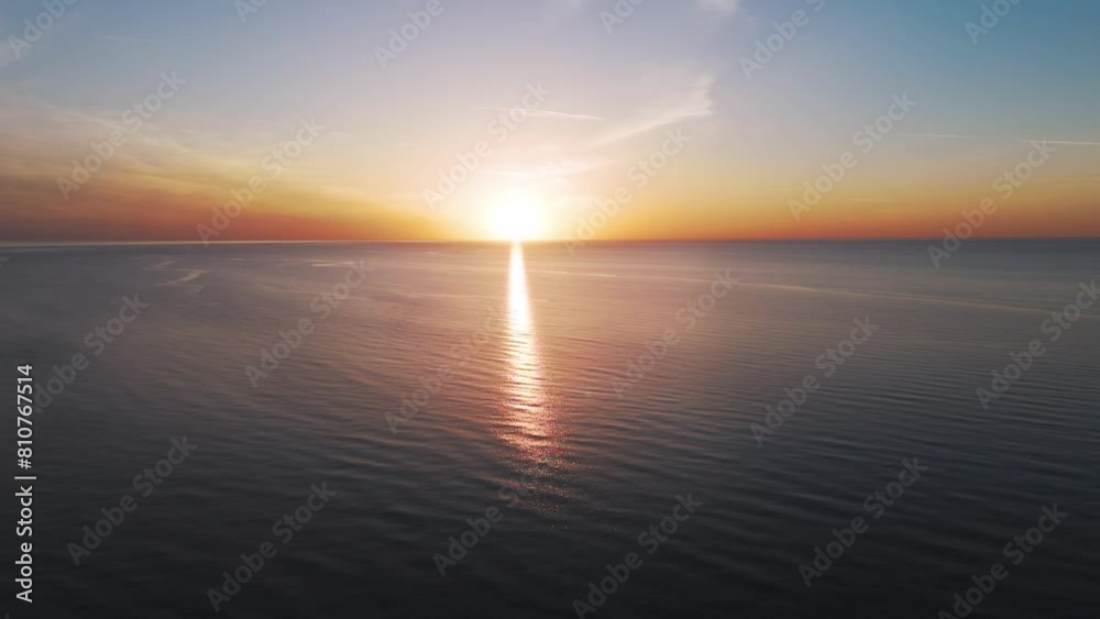 Aerial View of the Baltic Sea at Sunset, Jurkalne, Latvia. Beautiful Golden Sunset Over the Beach Seascape. Glittering Sunlight Reflection. The Baltic Sea at the Jurkalne Seashore Bluffs Aerial View of the Baltic Sea at Sunset, Jurkalne, Latvia. Beautiful Golden Sunset Over the Beach Seascape. Glittering Sunlight Reflection. The Baltic Sea at the Jurkalne Seashore Bluffs
