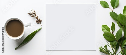 A blank stationery set is placed on a white paper background creating a template for branding identity It is ideal for graphic designers to showcase in their portfolios The image is a flat lay with a photo