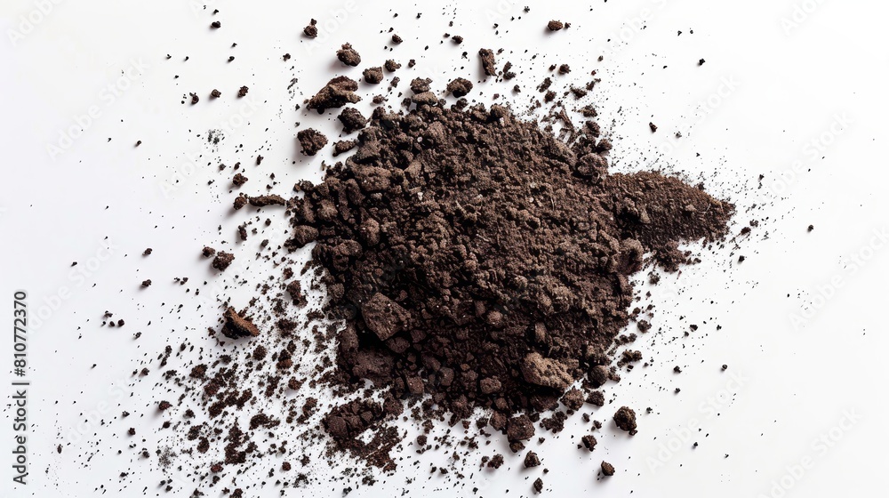 Top view of flying soil dirt piles, meticulously scattered on a white background with studio lighting to capture detailed textures Top view of flying soil dirt piles, meticulously scattered on a white background with studio lighting to capture detailed textures