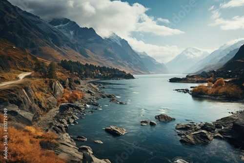 Tajikistan landscape. Majestic Autumn Mountain River Landscape with Winding Road.