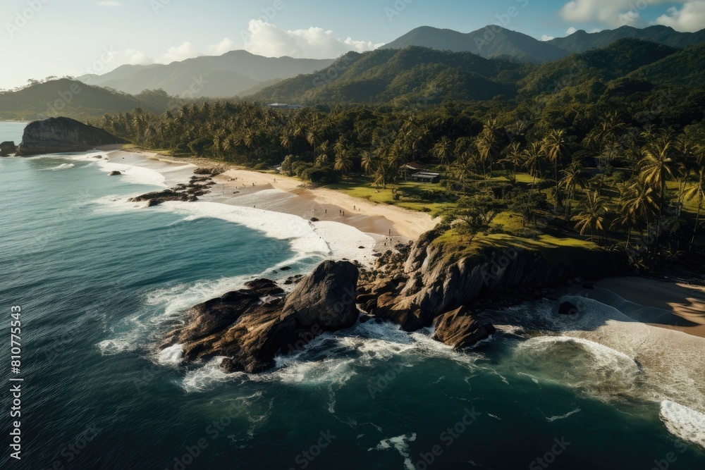 Trinidad and Tobago Aerial View of Tropical Beach with Rocky Coastline and Lush Mountains.