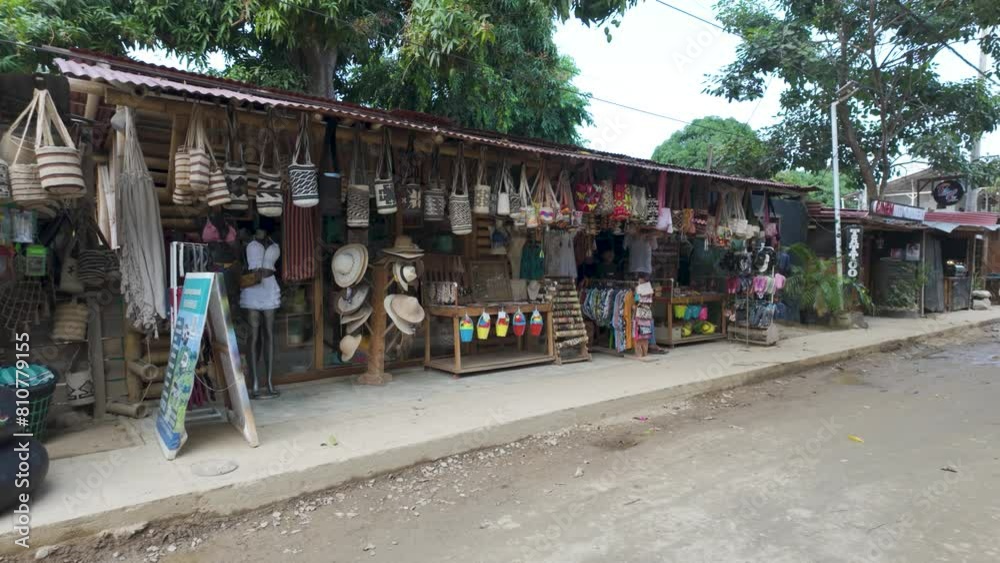 Typical marketplace stores on dirt road in Palomino town, Pan shot. Colombia Typical marketplace stores on dirt road in Palomino town, Pan shot. Colombia