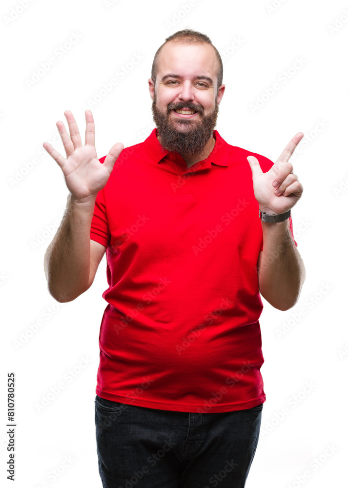 Naklejka premium Young caucasian hipster man wearing red shirt over isolated background showing and pointing up with fingers number seven while smiling confident and happy.