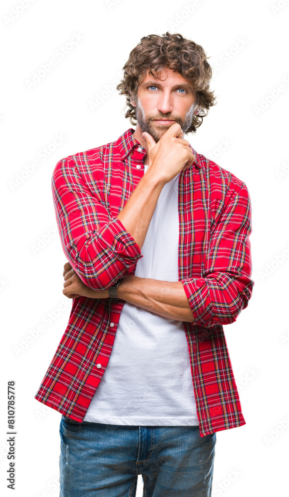 Handsome hispanic model man over isolated background looking confident at the camera with smile with crossed arms and hand raised on chin. Thinking positive. Handsome hispanic model man over isolated background looking confident at the camera with smile with crossed arms and hand raised on chin. Thinking positive.