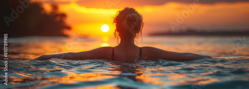 A lone girl  A Lone Swimmer in Golden Waters  Surrendering to the Tranquil Embrace of Nature   s Sunset Palette.   