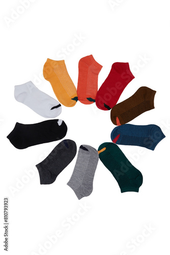Close-up shot of 10 pairs of cotton socks for women. A set of women's colorful short socks are isolated on a white background. Top view.