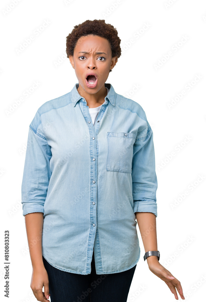 Young beautiful african american woman over isolated background In shock face, looking skeptical and sarcastic, surprised with open mouth Young beautiful african american woman over isolated background In shock face, looking skeptical and sarcastic, surprised with open mouth