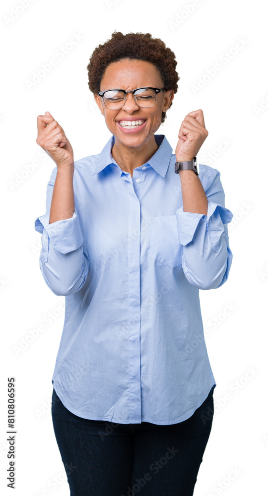 Young beautiful african american business woman over isolated background excited for success with arms raised celebrating victory smiling. Winner concept. Young beautiful african american business woman over isolated background excited for success with arms raised celebrating victory smiling. Winner concept.