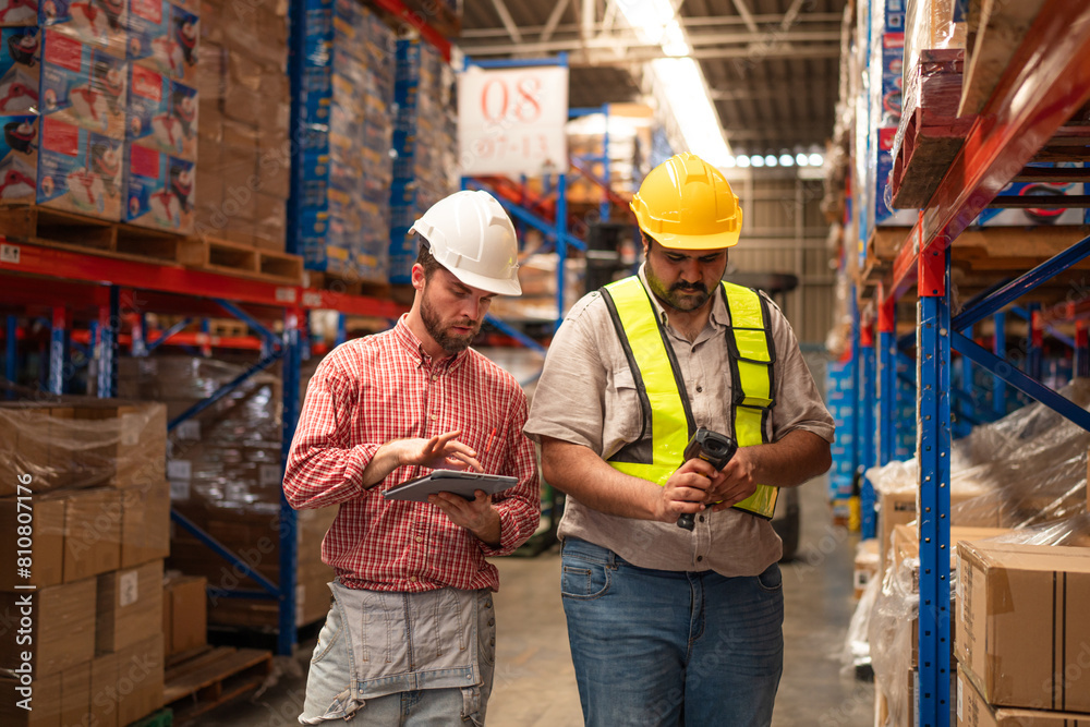 Warehouse employee worker with digital tablet talking on warehouse, Logistic industry concept. Warehouse employee worker with digital tablet talking on warehouse, Logistic industry concept.