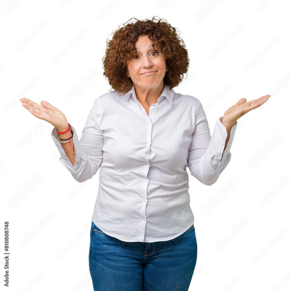 Beautiful middle ager senior businees woman over isolated background clueless and confused expression with arms and hands raised. Doubt concept. Beautiful middle ager senior businees woman over isolated background clueless and confused expression with arms and hands raised. Doubt concept.