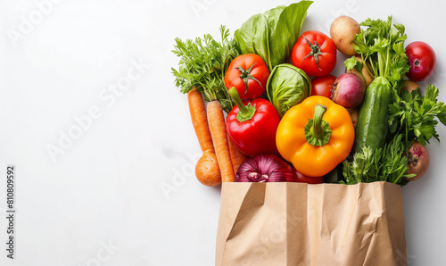Healthy eating. Healthy vegan vegetarian food in an eco paper bag. Vegetables and fruits on the table. copy space, banner. Supermarket. Shopping and clean vegan nutrition concept.