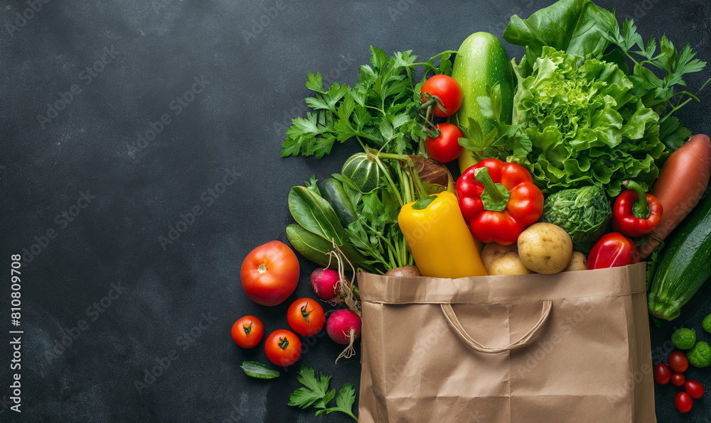 Healthy eating. Healthy vegan vegetarian food in an eco paper bag. Vegetables and fruits on the table. copy space, banner. Supermarket. Shopping and clean vegan nutrition concept.