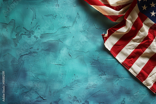 American flag celebrates Memorial Day against a backdrop of teal blue.