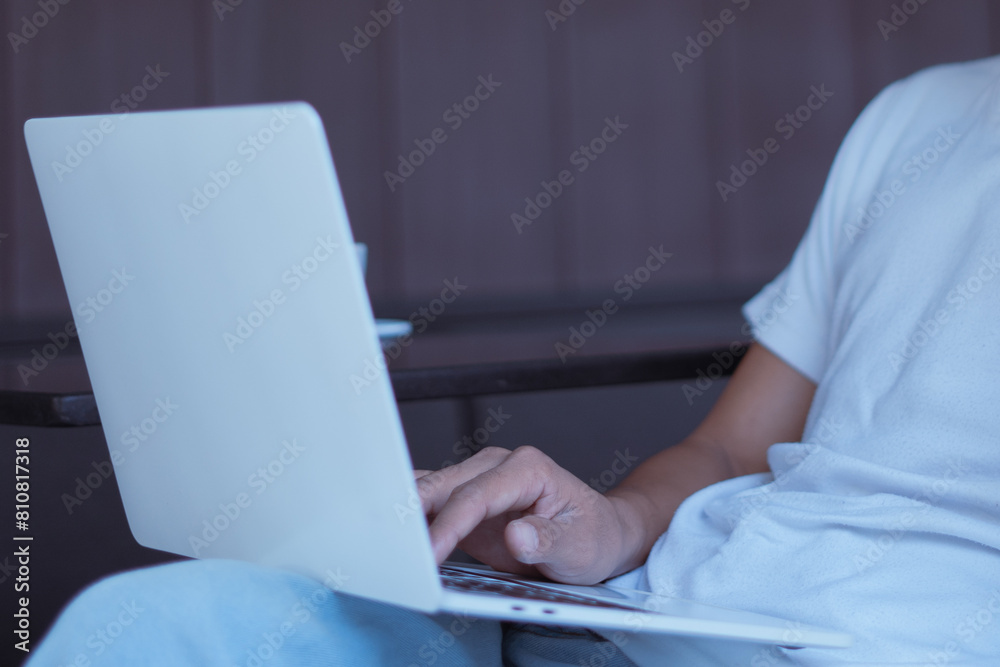 Fototapeta premium Young businessman's hands typing on laptop