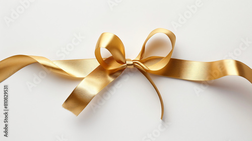 Golden ribbon bookmark on white background