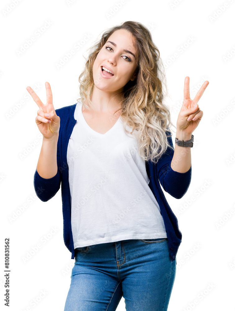 Beautiful young blonde woman over isolated background smiling looking to the camera showing fingers doing victory sign. Number two. Beautiful young blonde woman over isolated background smiling looking to the camera showing fingers doing victory sign. Number two.