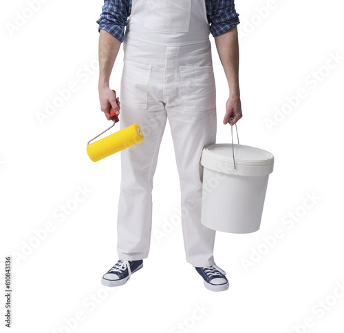 Professional painter standing and holding work tools