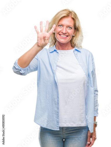 Middle age blonde woman over isolated background showing and pointing up with fingers number four while smiling confident and happy.