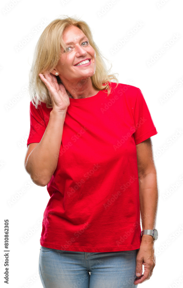 Middle age blonde woman over isolated background smiling with hand over ear listening an hearing to rumor or gossip. Deafness concept. Middle age blonde woman over isolated background smiling with hand over ear listening an hearing to rumor or gossip. Deafness concept.