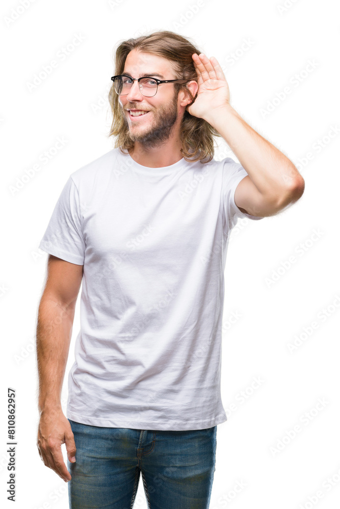 Young handsome man with long hair wearing glasses over isolated background smiling with hand over ear listening an hearing to rumor or gossip. Deafness concept. Young handsome man with long hair wearing glasses over isolated background smiling with hand over ear listening an hearing to rumor or gossip. Deafness concept.