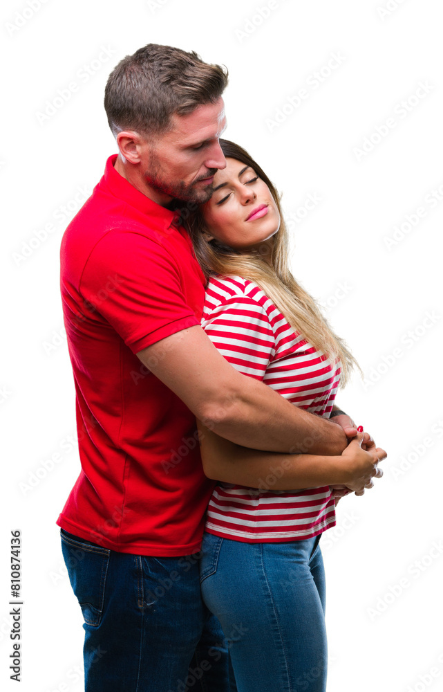 Young couple in love over isolated background looking to side, relax profile pose with natural face with confident smile. Young couple in love over isolated background looking to side, relax profile pose with natural face with confident smile.