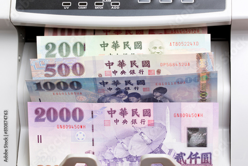 Taiwan dollar in a counting machine