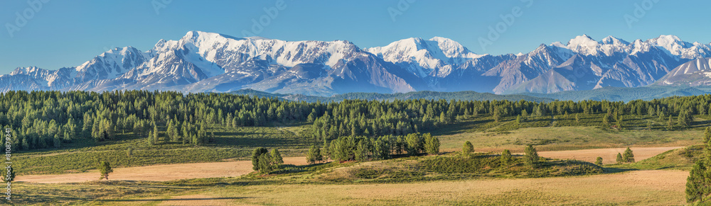 Fototapeta premium Panoramic view snowy ridge, trekking and climbing 