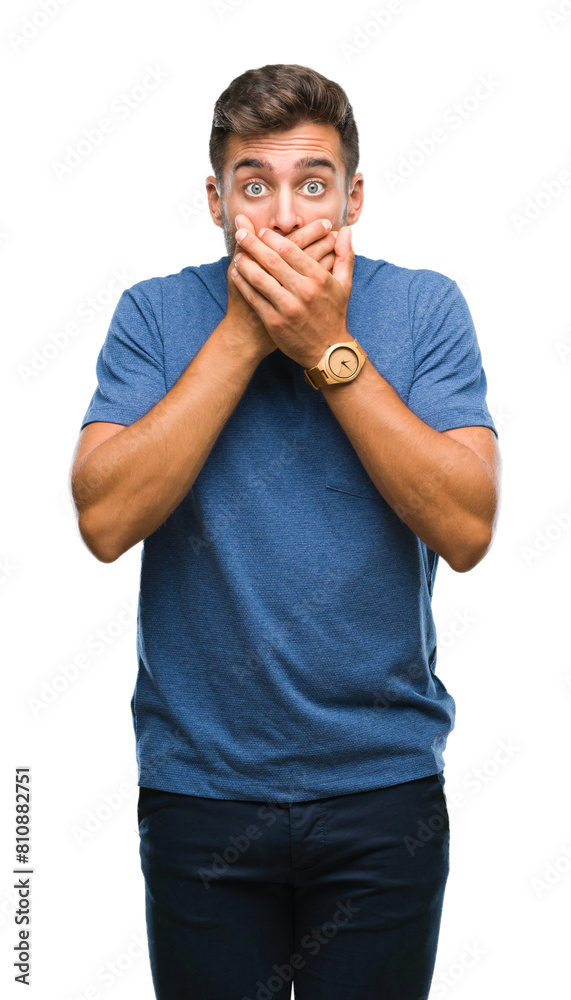 Young handsome man over isolated background shocked covering mouth with hands for mistake. Secret concept. Young handsome man over isolated background shocked covering mouth with hands for mistake. Secret concept.