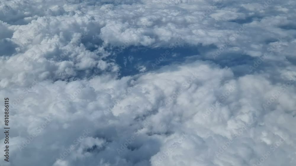 Aerial view of clouds, blue sunny sky, bird's-eye view. Aerial view of clouds, blue sunny sky, bird's-eye view.