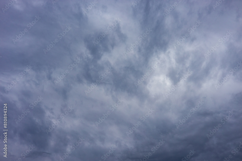 background in the form of a cloudy gray sky.