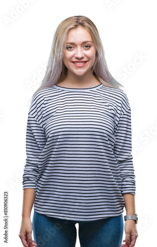 Young blonde woman over isolated background with a happy and cool smile on face. Lucky person.