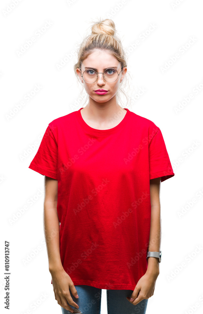 Young beautiful blonde woman wearing red t-shirt and glasses over isolated background depressed and worry for distress, crying angry and afraid. Sad expression. Young beautiful blonde woman wearing red t-shirt and glasses over isolated background depressed and worry for distress, crying angry and afraid. Sad expression.