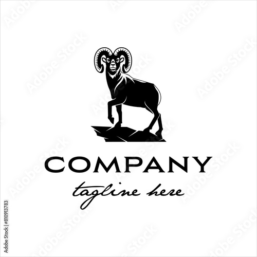 Bighorn sheep standing on cliff with masculine style design