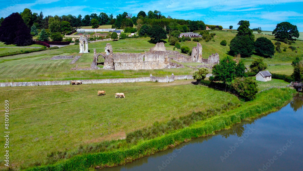 Obraz premium Aerial view of the ruins of Kirkham Priory, situated on the banks of the River Derwent at Kirkham, North Yorkshire, England. The Augustinian priory was founded in the 1120. 