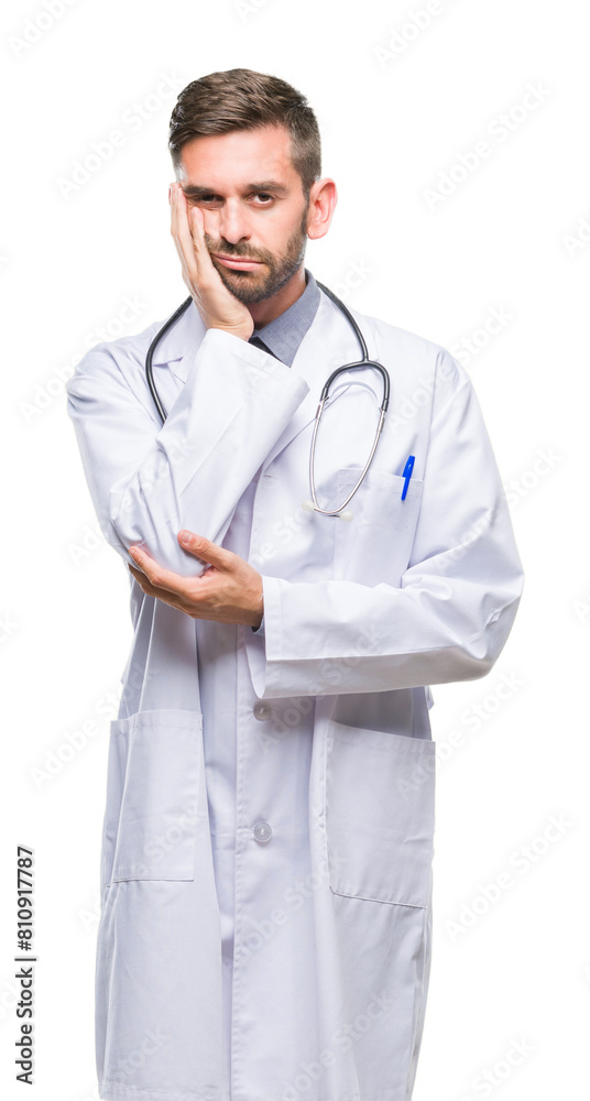 Young handsome doctor man over isolated background thinking looking tired and bored with depression problems with crossed arms. Young handsome doctor man over isolated background thinking looking tired and bored with depression problems with crossed arms.