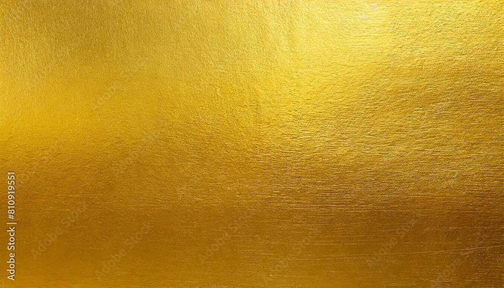 Gold wall texture background. Yellow shiny gold foil paint on wall sheet with gloss light reflection, vibrant golden paper luxury wallpaper Gold wall texture background. Yellow shiny gold foil paint on wall sheet with gloss light reflection, vibrant golden paper luxury wallpaper