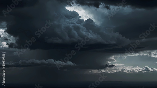 Thick dark clouds in the sky. Gray weather, panoramic view